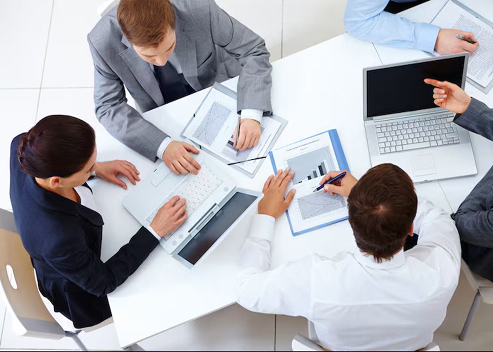 top view co workers planning strategy 1098 2959